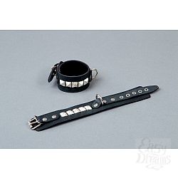 Чёрные кожаные наручники с металлическими квадропуклями Чёрные кожаные наручники с металлическими квадропуклями